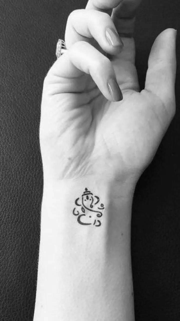 46 Om Tattoo On Wrists