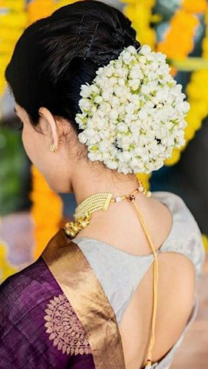 Reception makeover with hair half pinned & curled,adorned with jasmine  flower string to match … | Wedding guest hairstyles, Beautiful indian  actress, Glamour beauty