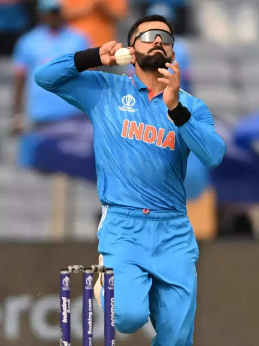 Virat Kohli bowling style know how many wickets he took किंग कोहलीची