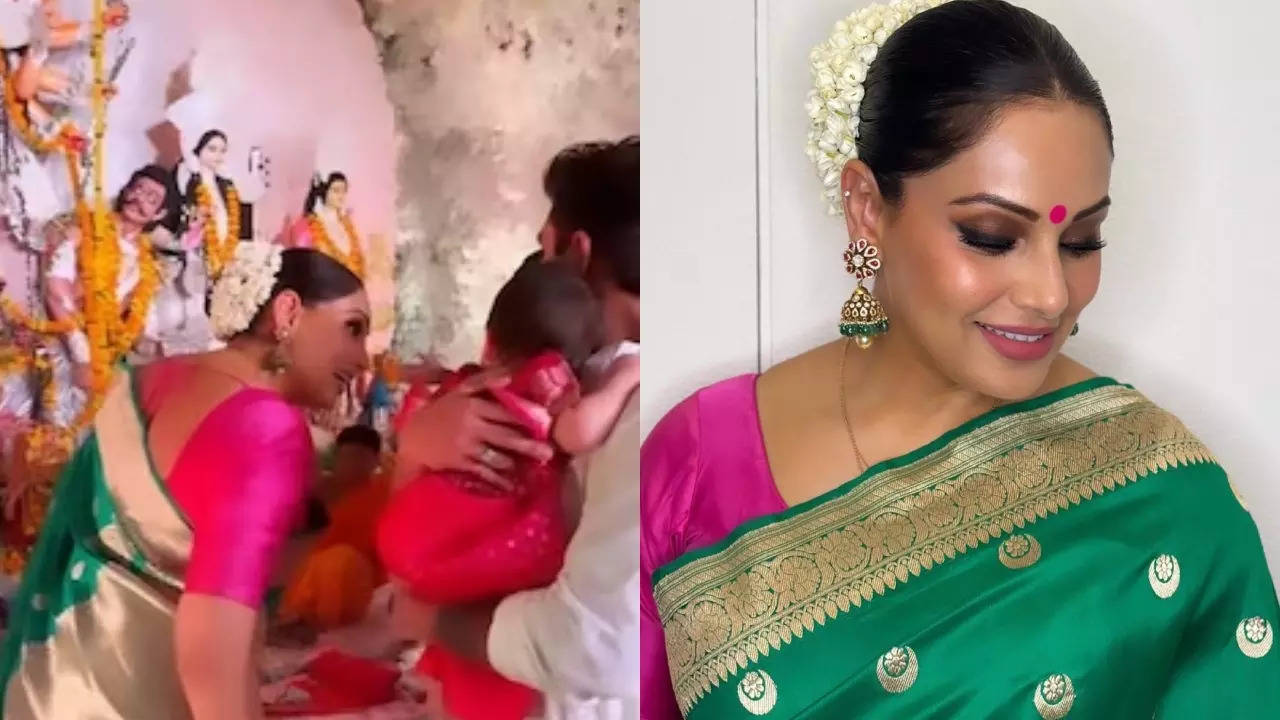 Bipasha Basu visits Durga Puja Pandal with Karan and daughter Devi