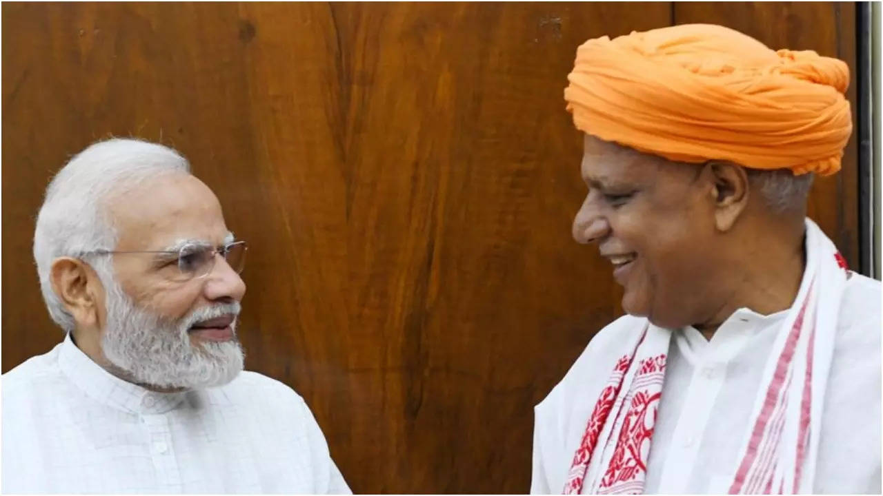 BJP MP Virendra Singh with PM Modi