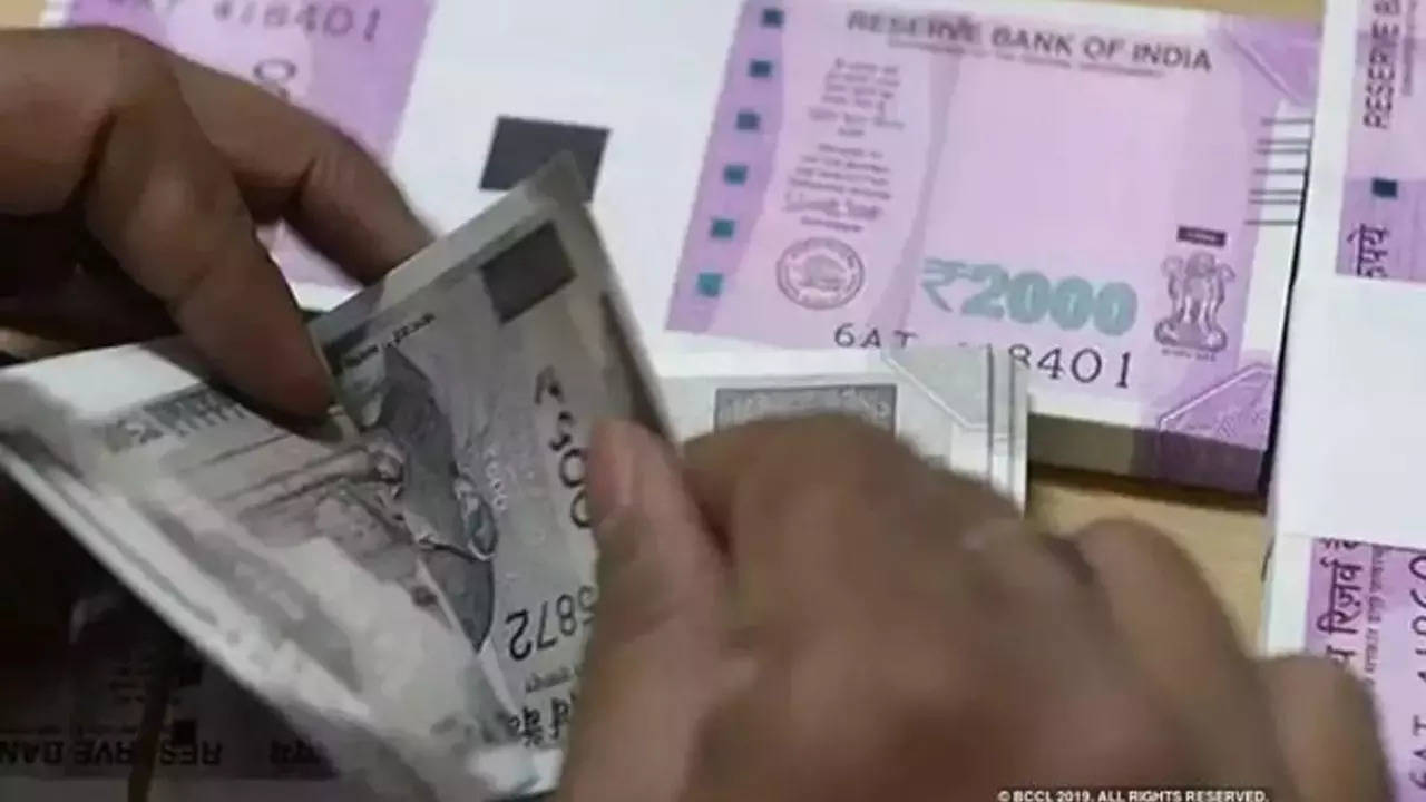 Money Being COunted After Cash Withdrawal