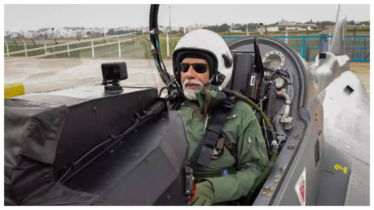 pm modi flying Tejas