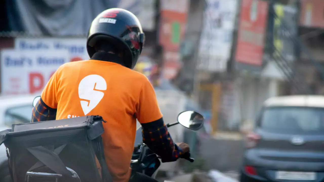 swiggy, swiggy ipo, swiggy financials, corporate governance,Swiggy delivery boy