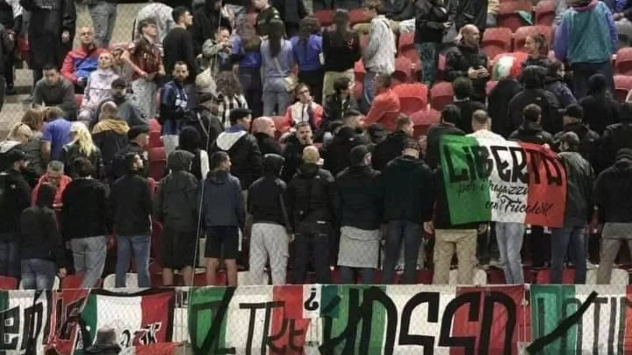 italian fans show thier backs during national anthem of israel in nations league football match