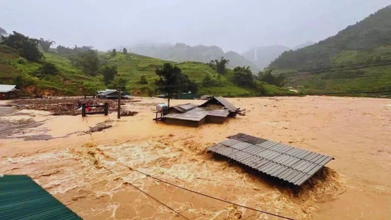 flash flood sweeps away hamlet as vietnams storm toll rises to 155 dead