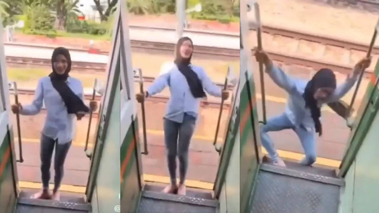 today trending video girl was standing at train gate and making reels then see what happened