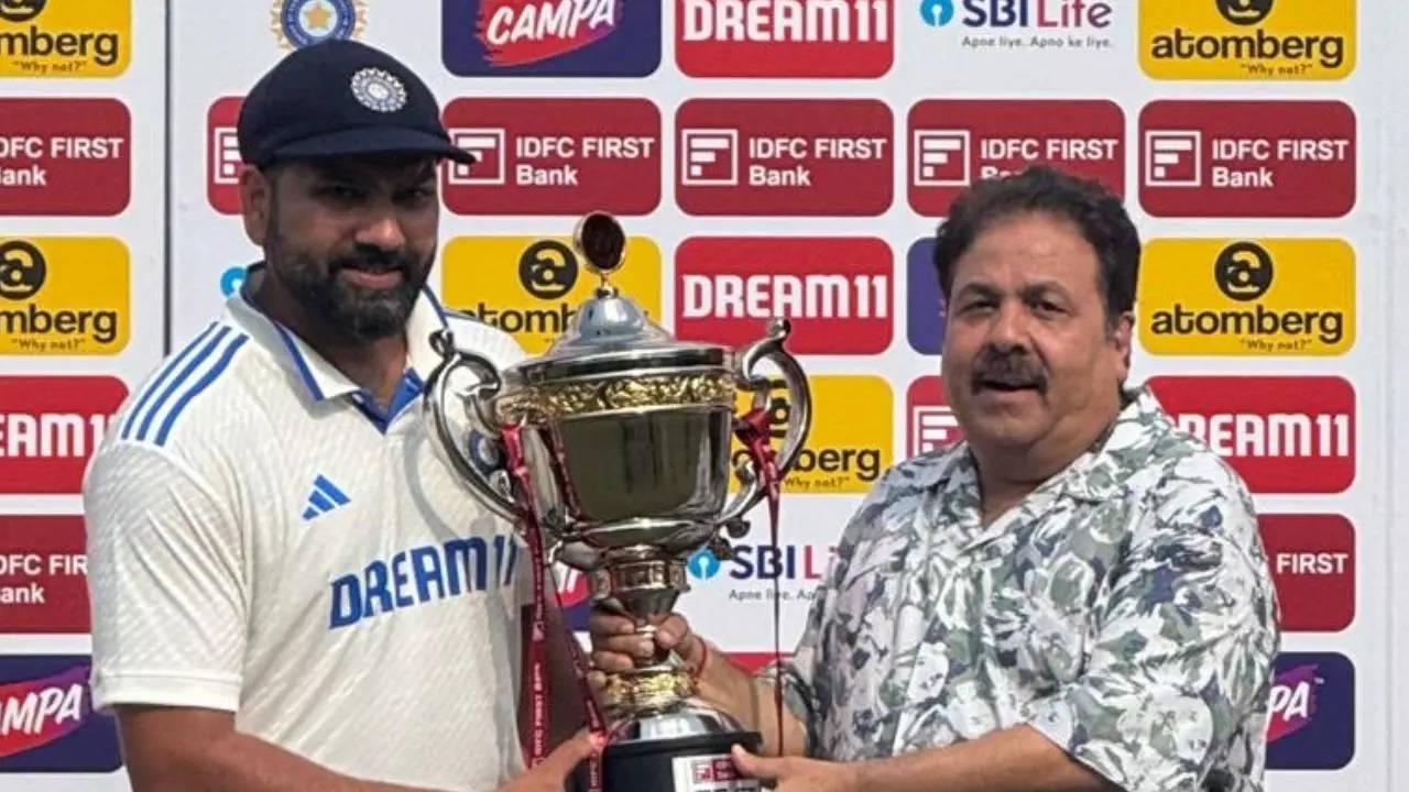 rohit with trophy