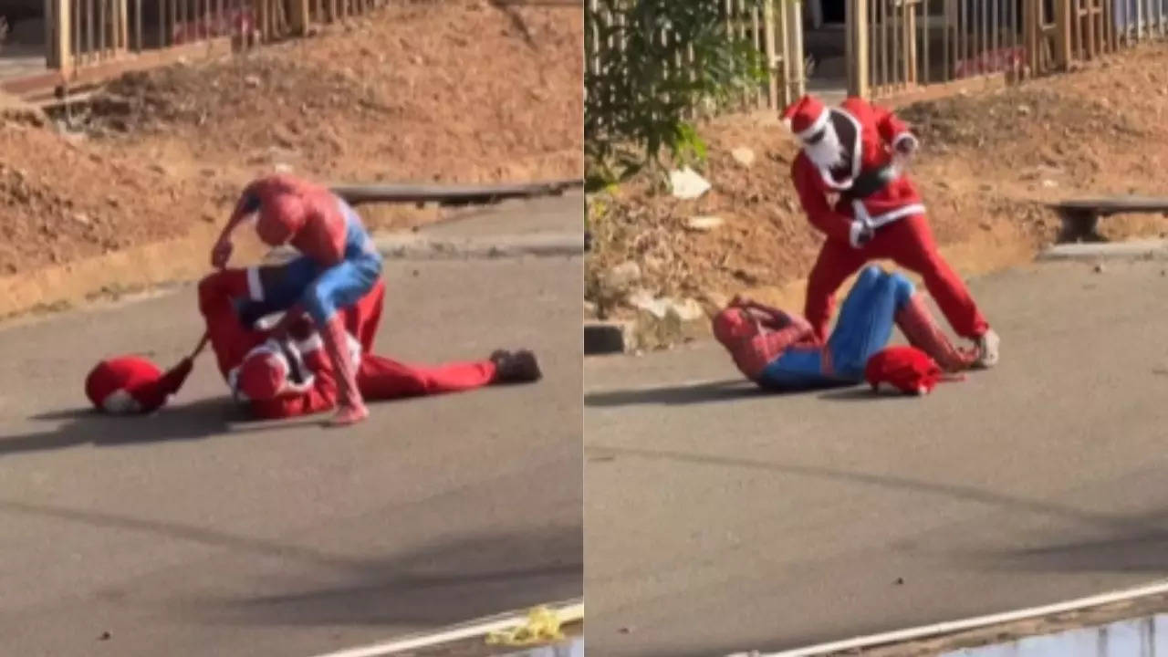 santa claus and spiderman fight 