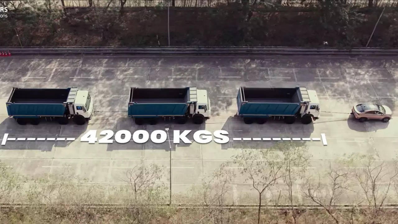 Tata Curvv EV Pulls 3 Trucks Weight 42000 Kg