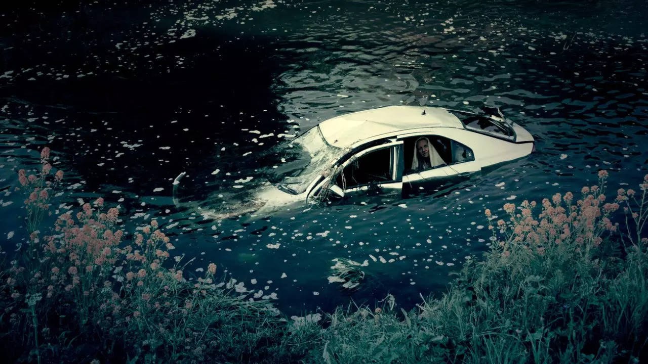 car in river