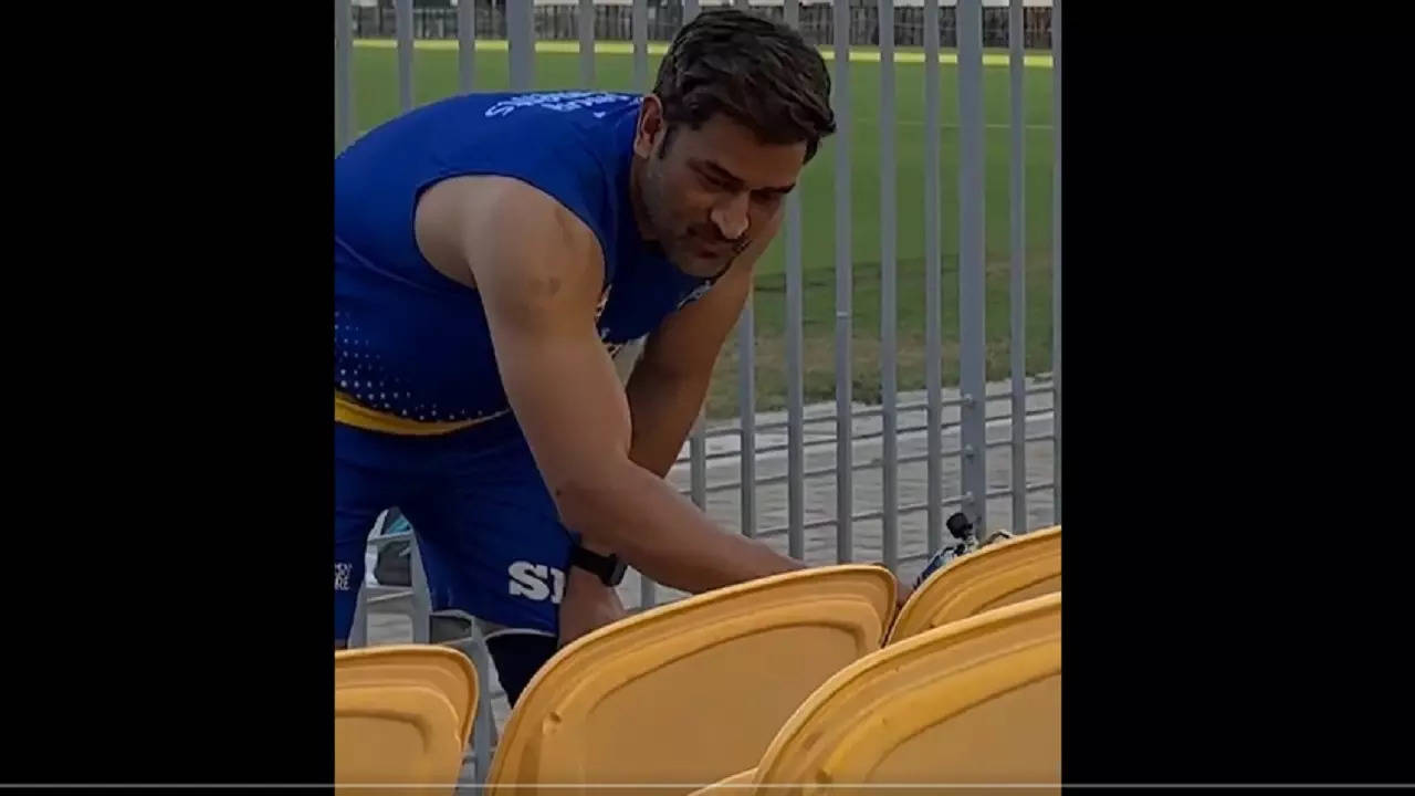 CSK Captain MS Dhoni painting chepauk stadium seats ahead of ipl 2023